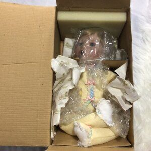 Vintage “Jesus Loves Me” Precious Moments porcelain doll 1998